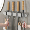 Universal wall mount for household tools